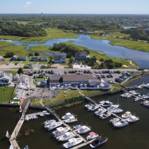 aerial drone photo of boats, river, buildings